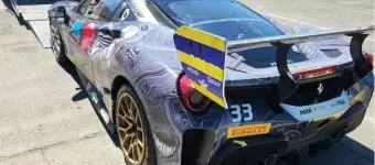 Sports car gets into a transport truck