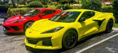 Two yellow and red Corvettes