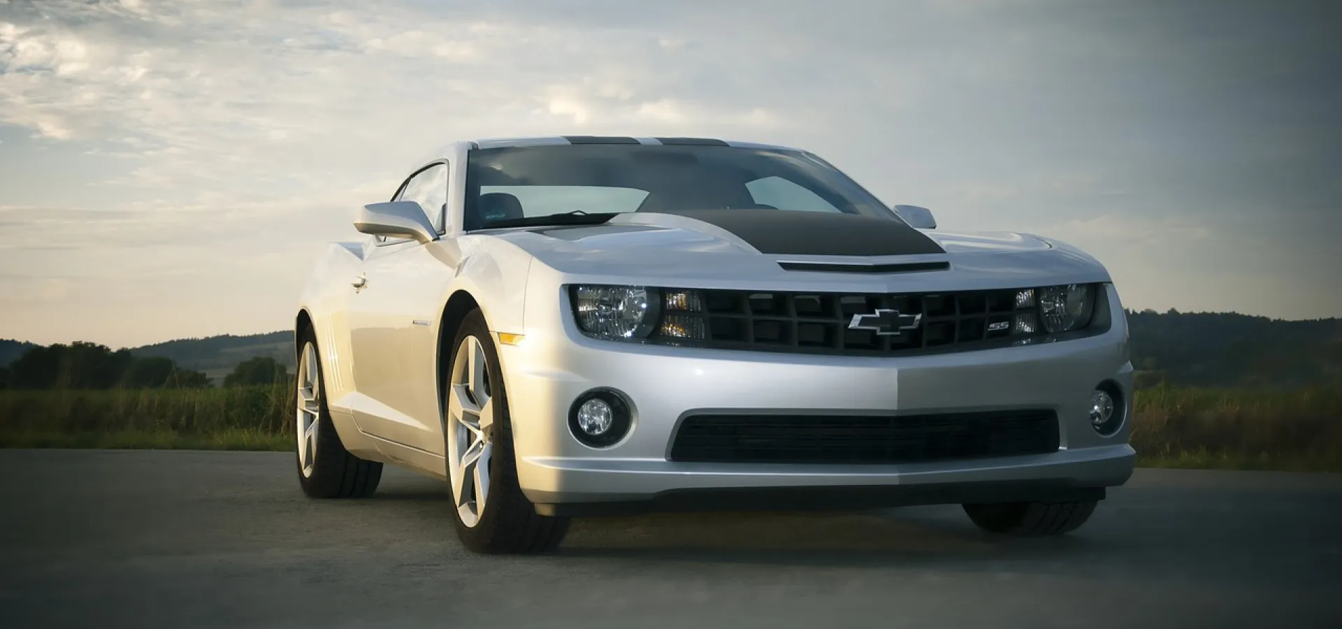 Grey Chevrolet on the beautiful sunset