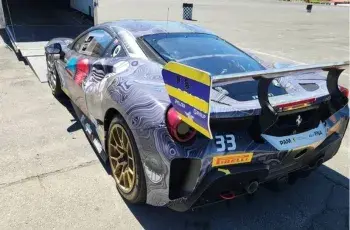 Sports car gets into a transport truck