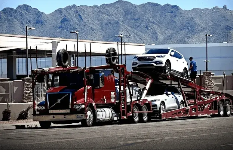 Cars uploaded on a carrier Cars uploaded on a carrier