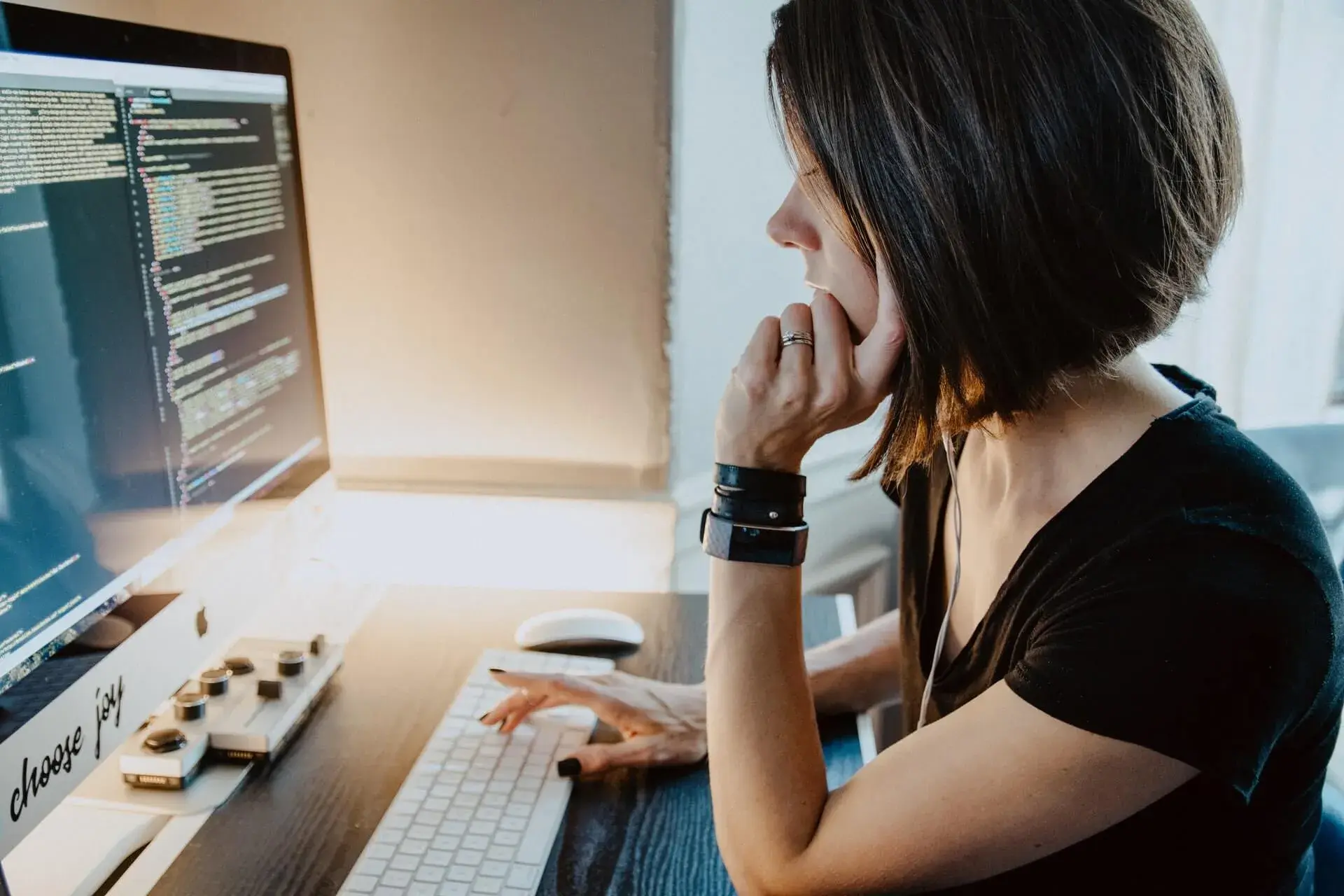 Woman sitting in front of computer Woman sitting in front of computer