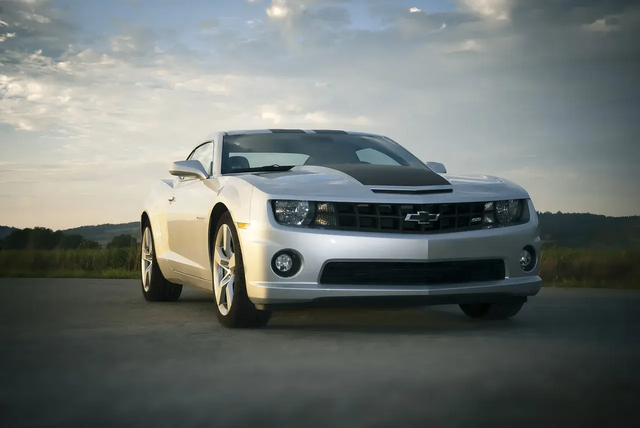 Grey Chevrolet on the beautiful sunset Grey Chevrolet on the beautiful sunset