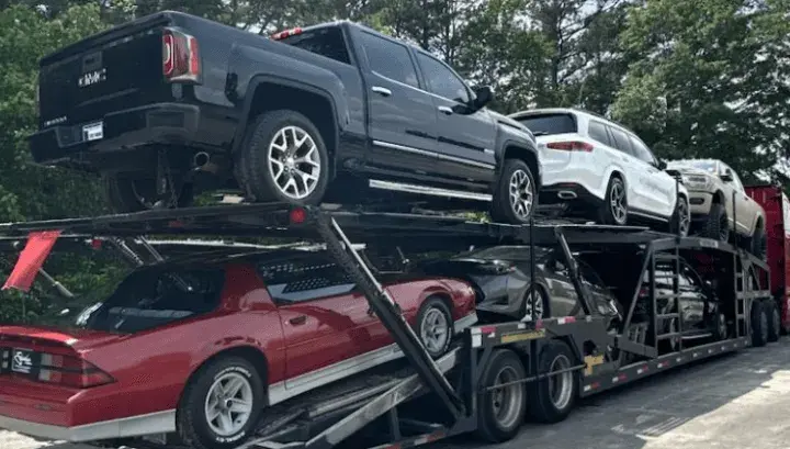 Open car trailer loaded with cars Open car trailer loaded with cars