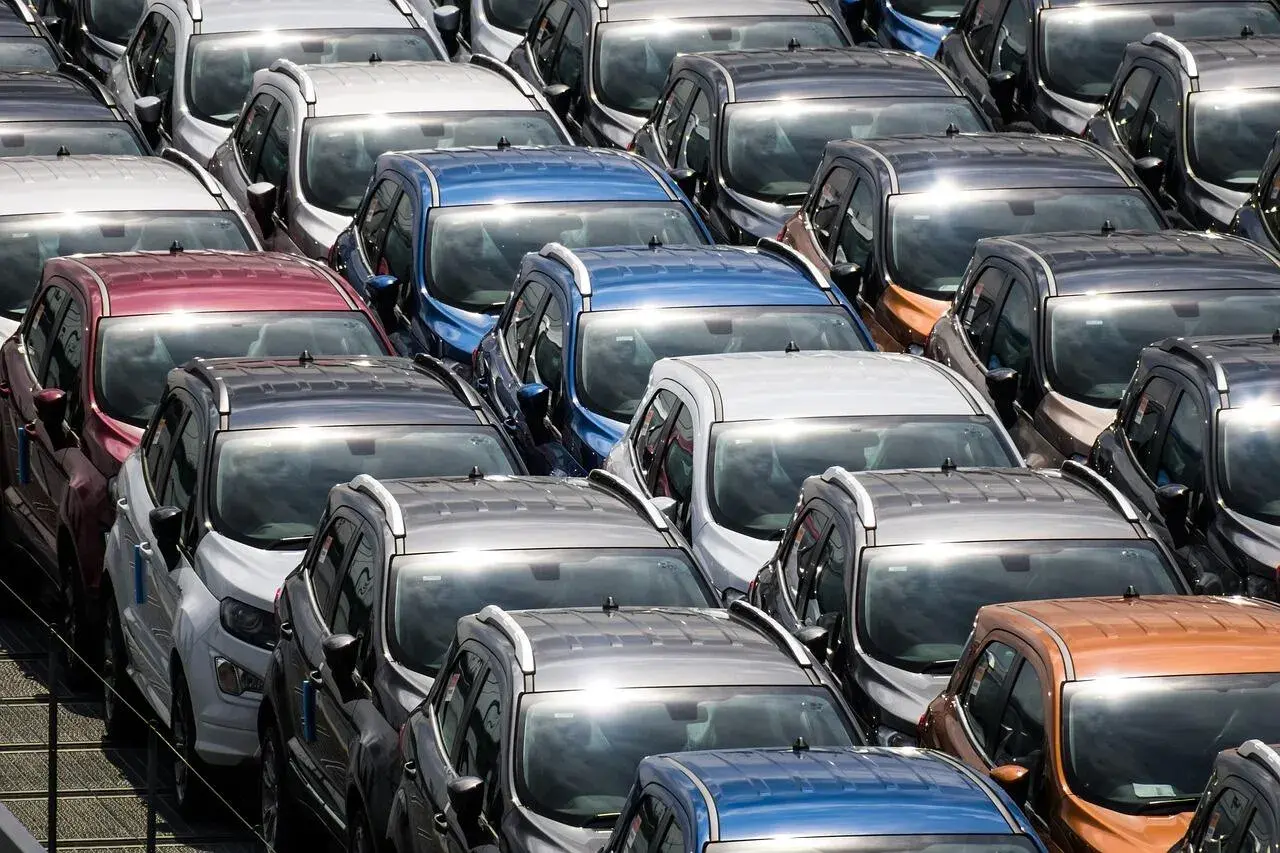 Many cars in the dealership Many cars in the dealership