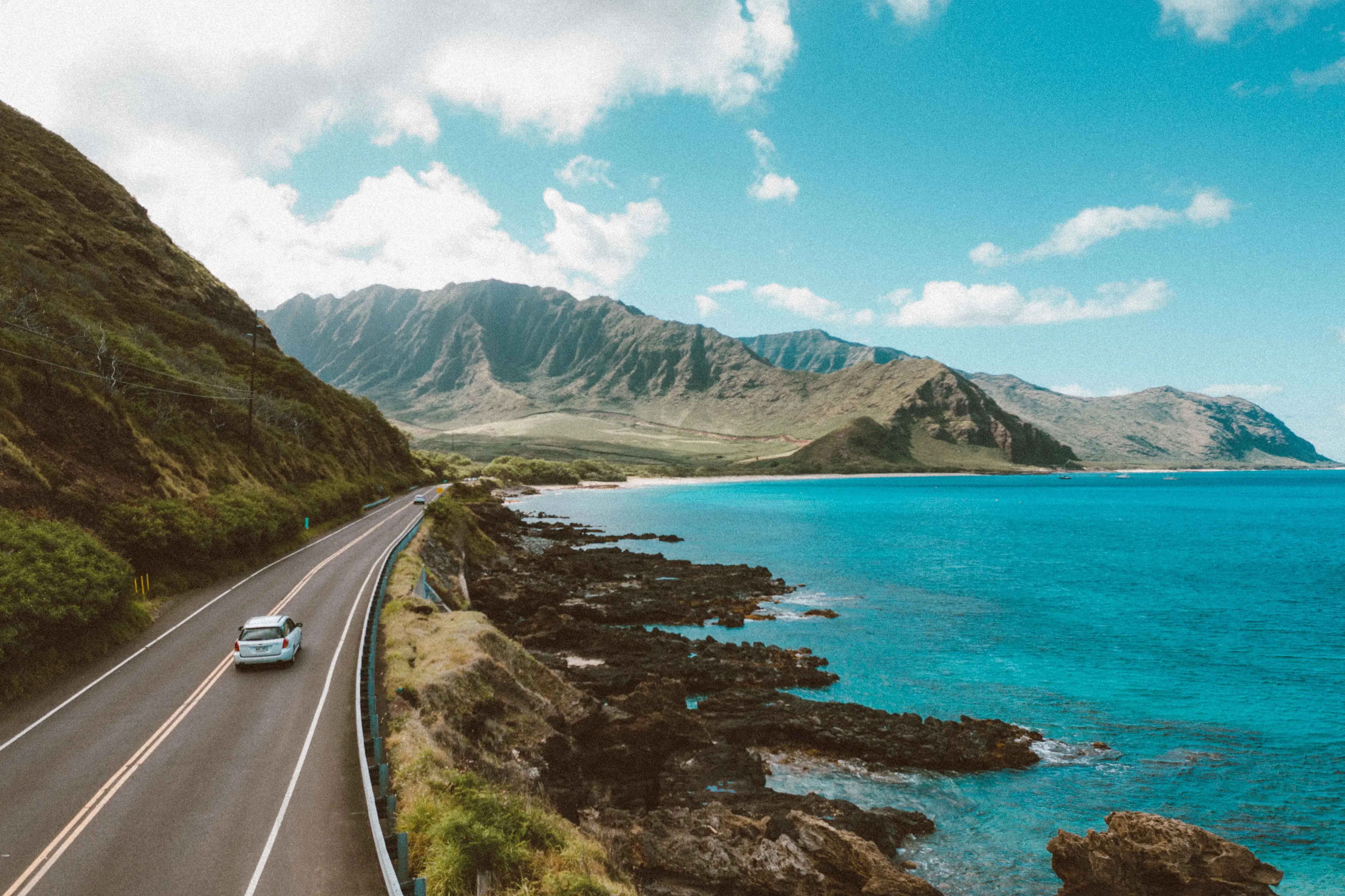White Car on the Hawaii coastline White Car on the Hawaii coastline