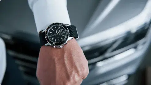 Hand with black watch Hand with black watch